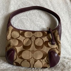 Coach Shoulder Bag- Tan/Brown Print with Deep Purple Leather Trim.